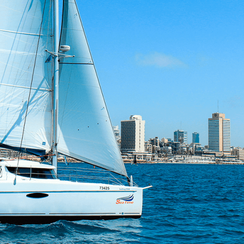 Catamaran with Tel Aviv skyline